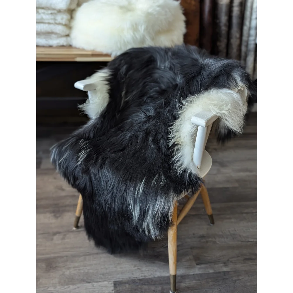 Cozy 53x34 Icelandic sheepskin throw on wooden chair by Angus Oliver
