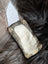 Squirrel coin purse made of olive green cotton canvas with cream floral edges and a soft sheepskin tail detail