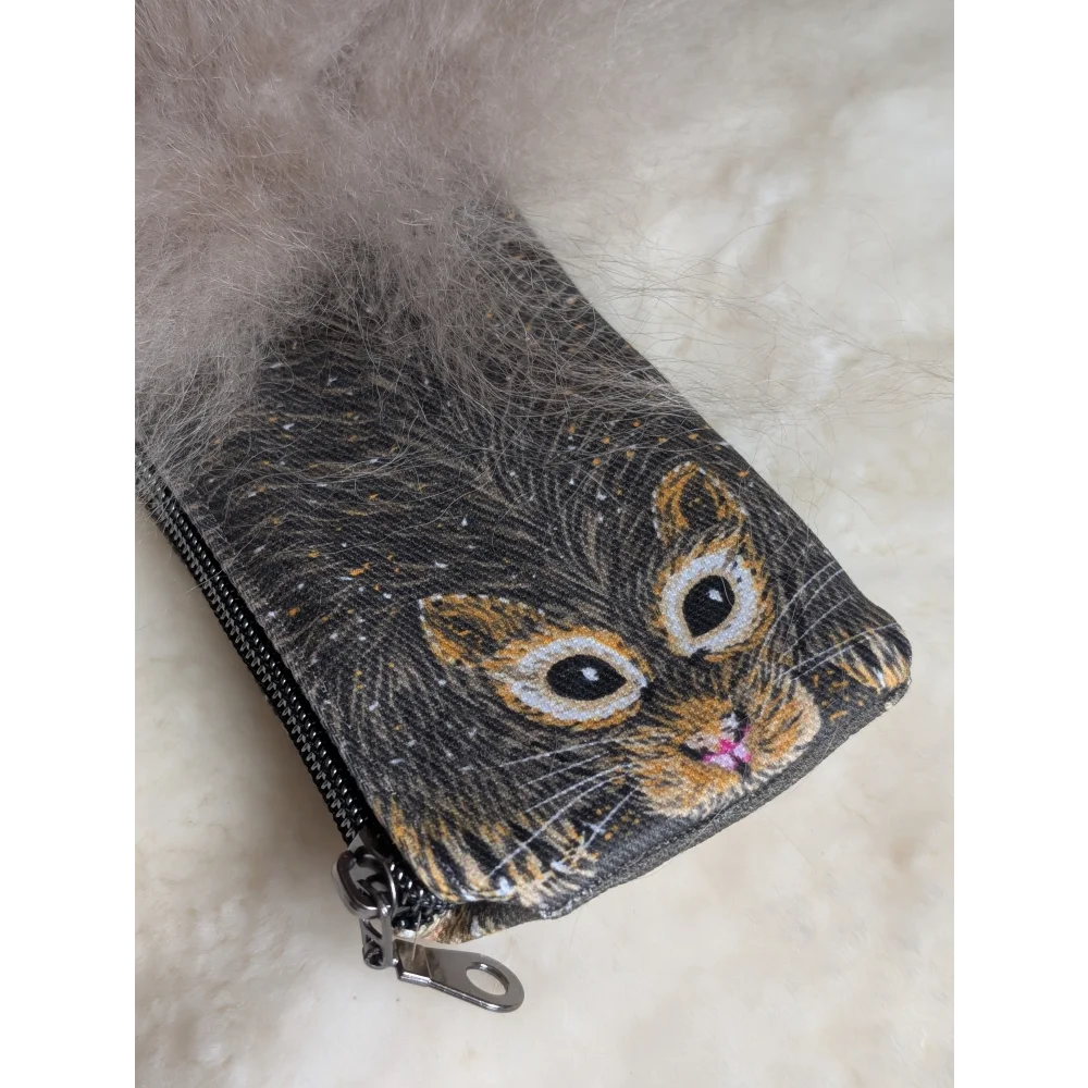 Dark gray cotton canvas coin purse with embroidered cat face and fluffy gray sheepskin tail trim