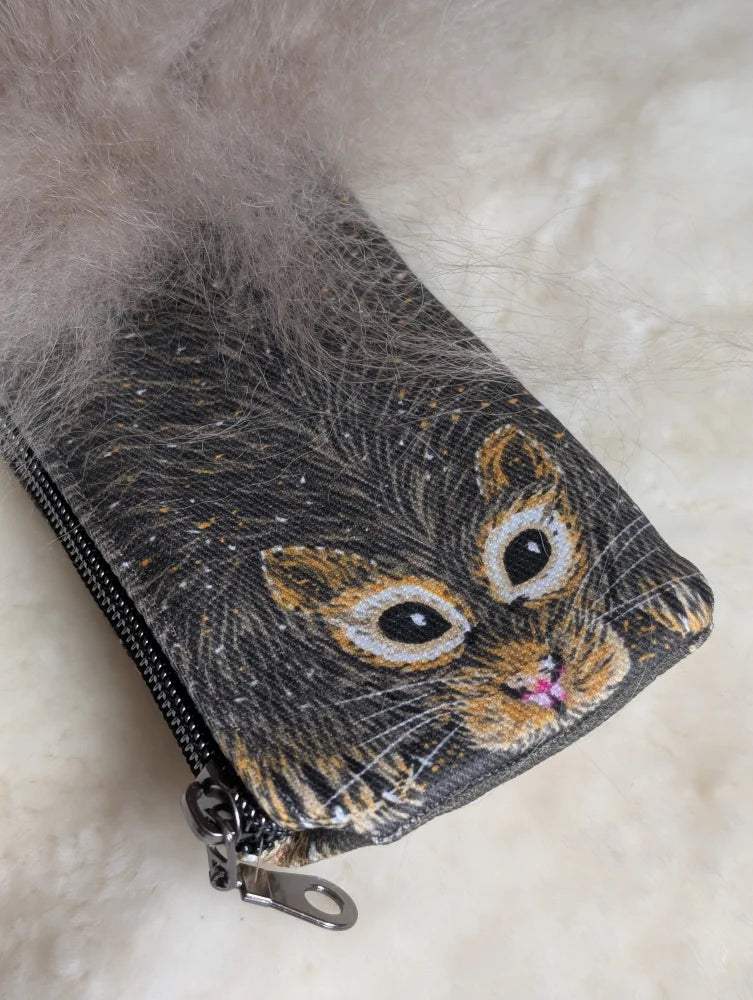 Dark gray cotton canvas coin purse with embroidered cat face and fluffy gray sheepskin tail trim