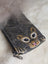 Dark gray cotton canvas coin purse with embroidered cat face and fluffy gray sheepskin tail trim