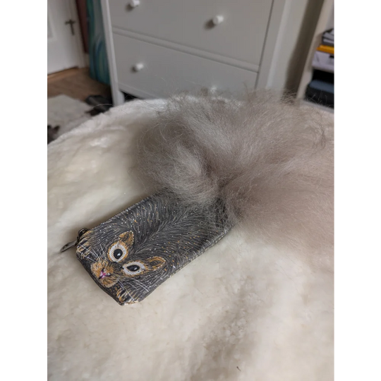 Gray squirrel coin purse made of cotton canvas with a fluffy sheepskin tail attachment for storing coins
