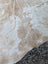 Large cowhide rug in natural tan and white with soft texture adds rustic charm to any space as a beautiful rug