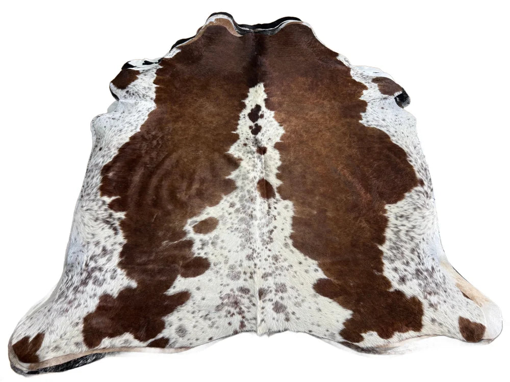 Ss873 large cowhide rug with beautiful irregular dark brown patches on a white base showcasing unique characteristics