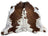 Ss873 large cowhide rug with beautiful irregular dark brown patches on a white base showcasing unique characteristics