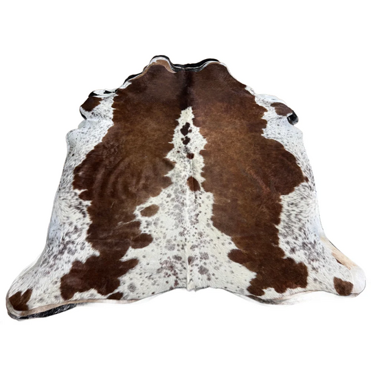 Ss873 large cowhide rug with beautiful irregular dark brown patches on a white base showcasing unique characteristics