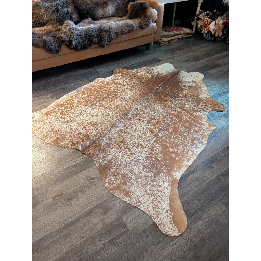 82x74 large cowhide rug with beautiful brown and white speckled pattern and unique natural edges perfect for decor