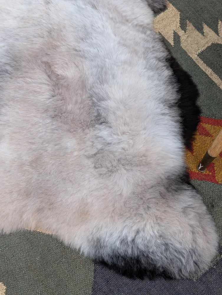 Large 44 by 31 gray soft fluffy icelandic sheepskin rug with natural texture by angus oliver