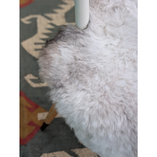 White fluffy 44 x 27 inch large icelandic sheepskin chair cover with long wool icelandic soft plush texture by angus oliver