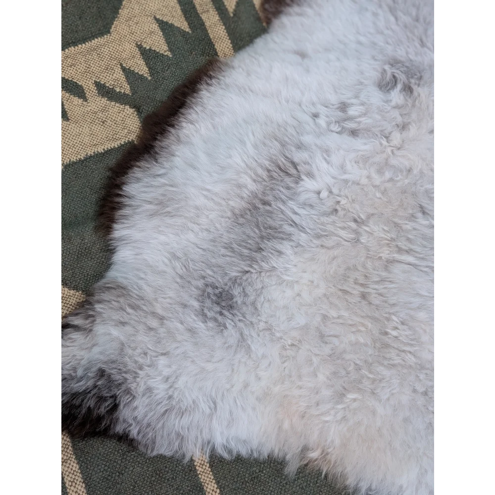 Large 44.5 x 31 inch soft fluffy white icelandic sheepskin rug with natural gray and black markings angus oliver