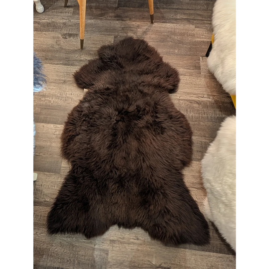 Rich dark brown extra large british sheepskin rug from angus oliver with plush natural fur texture 53 x 30 inches