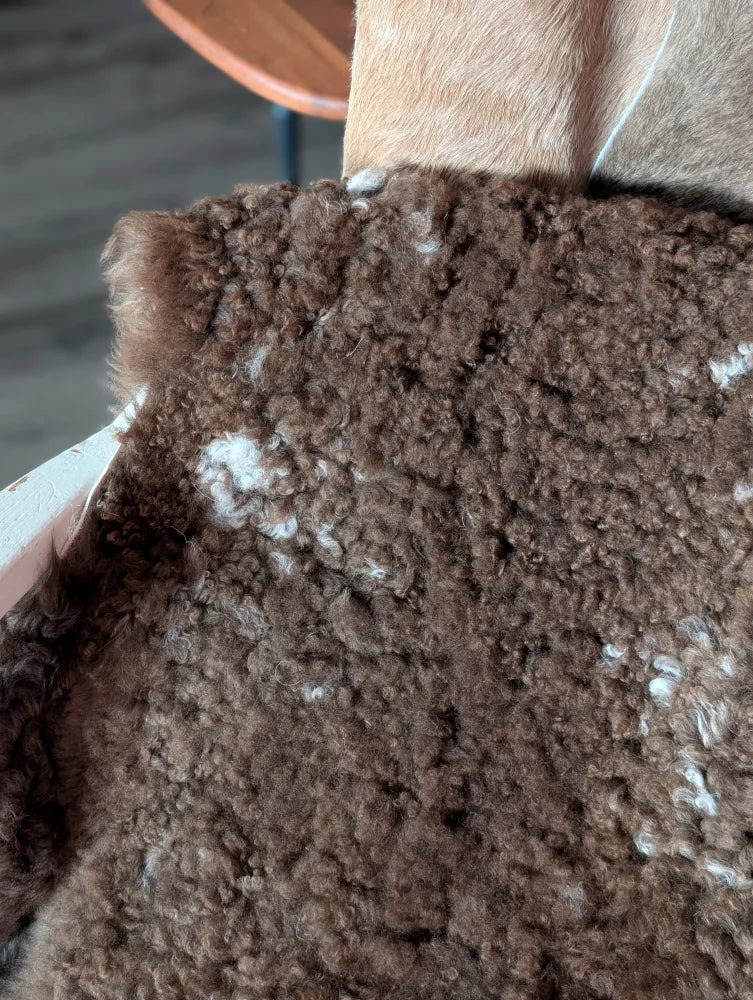 Brown curly fur tibet highland spotted sheepskin coat with white flecks in grade a highland spotted sheepskin