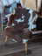 Brown and white tibet highland spotted grade a- sheepskin chair cover from nat’s grade perfect for cozy seating