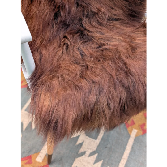 A plush long wool icelandic 50 x 27 extra large brown sheepskin rug with soft natural texture