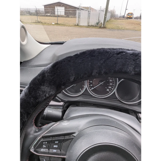 Black faux fur steering wheel cover by Angus Oliver