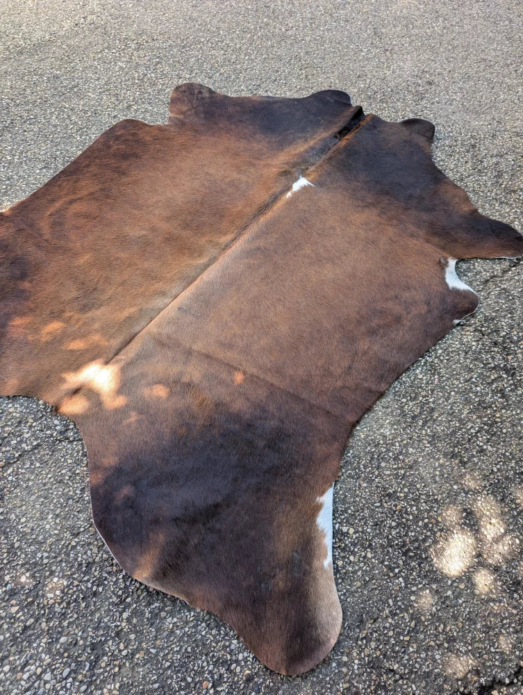 Sun13 77 x 66 lovely large cowhide rug with brown black and natural white markings showing unique characteristics