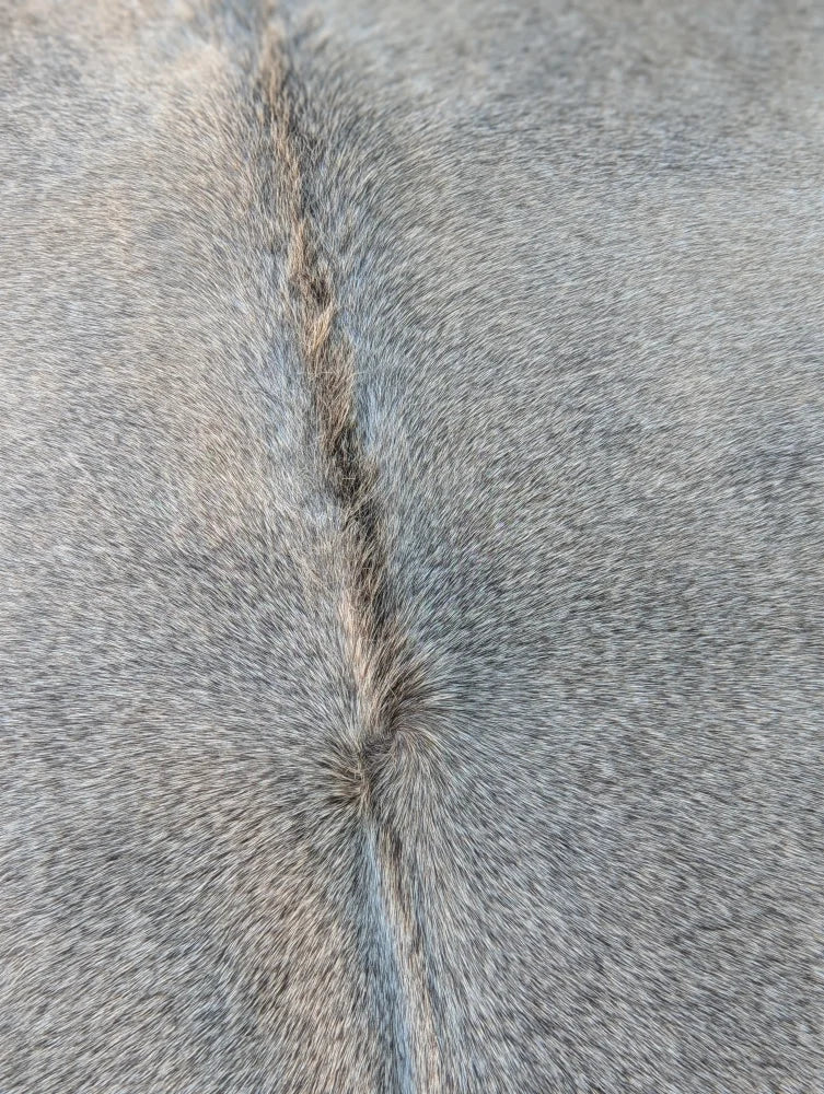 Gray faux fur lovely cowhide rug sun15 74.5 x 64 with central seam shows unique characteristics of large cowhide