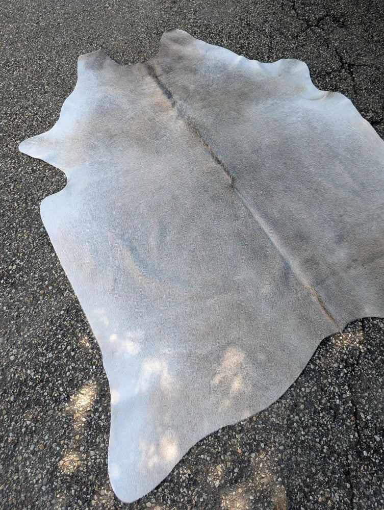 Large lovely cowhide rug sun15 74.5 x 64 with natural gray fur texture and unique characteristics