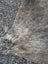 Sun2 77 x 64 large cowhide rug with brown and gray natural fur texture showcasing unique characteristics