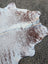 Large cowhide lovely cowhide rug 84 by 66 inches white and brown speckled with natural irregular edge and unique characteristics