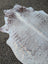 Large cowhide lovely cowhide rug 84 by 66 inches with white and brown spots and unique natural irregular edges
