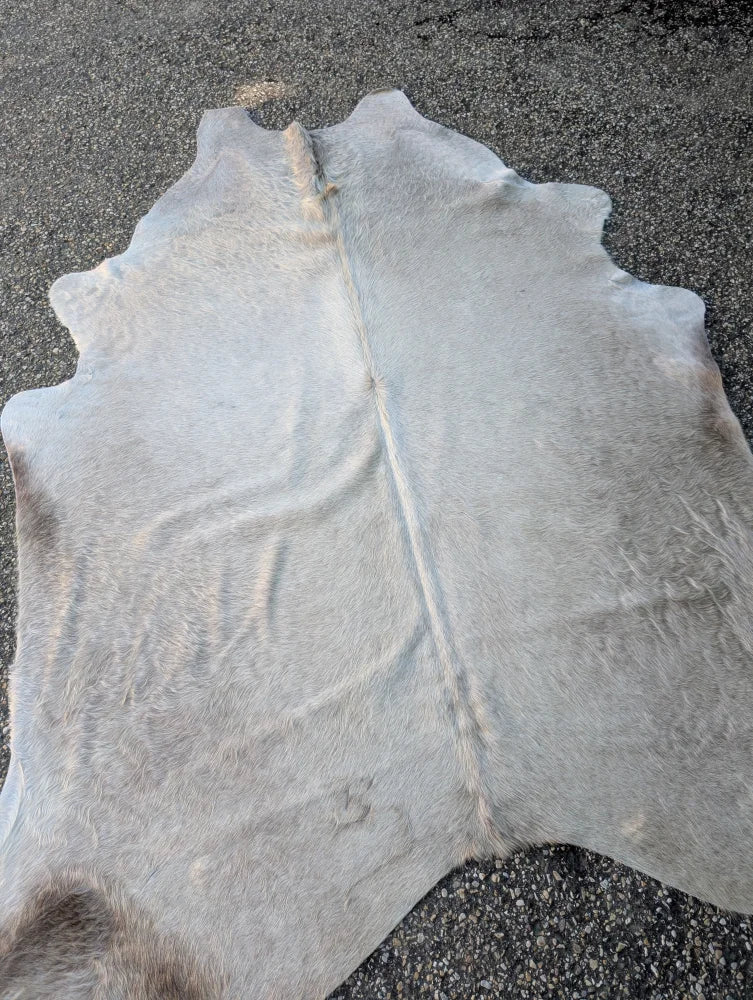 Sun9 83 x 74 large cowhide rug in light gray with natural texture and unique characteristics perfect for cozy spaces