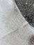 Soft light gray large cowhide rug with plush faux fur texture and unique characteristics by sun9