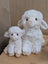 Super soft lambs plush lamb toy with soft white fluffy texture and black button eyes perfect for cuddling