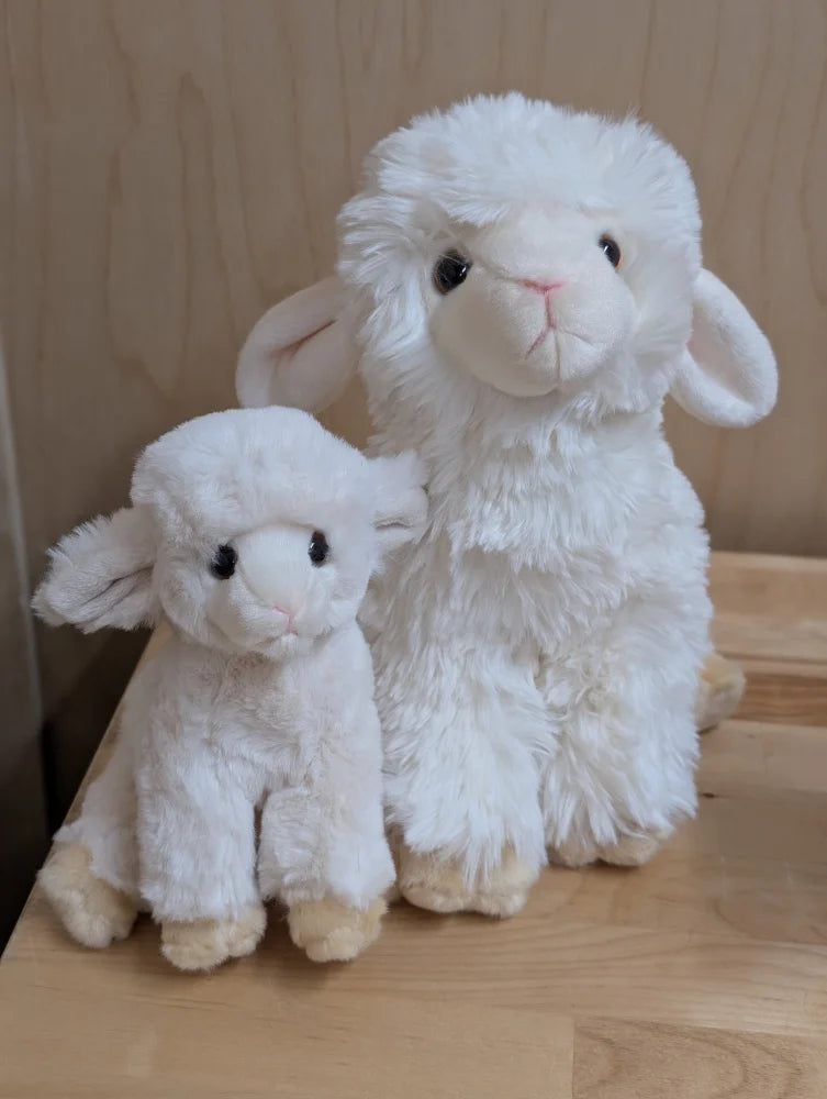 Super soft lambs white plush stuffed animal with fluffy texture and black button eyes perfect for cuddling