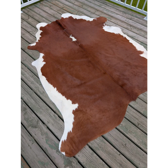 T13 80 x 68 large cowhide rug with brown and white natural fur texture and unique characteristics