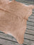 Tan large cowhide rug with natural fur texture and irregular edges from angus oliver t19 78 by 64 inches