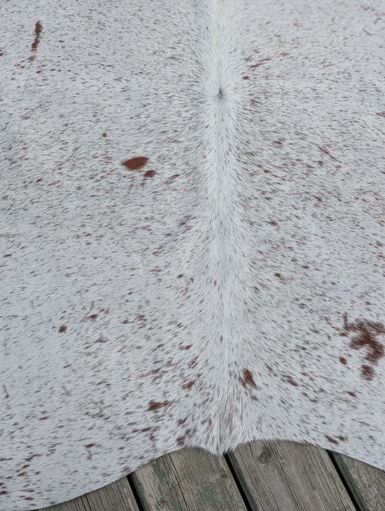 Large cowhide rug t2 heart 73 x 63 with white and natural brown speckles and soft fuzzy texture with unique characteristics
