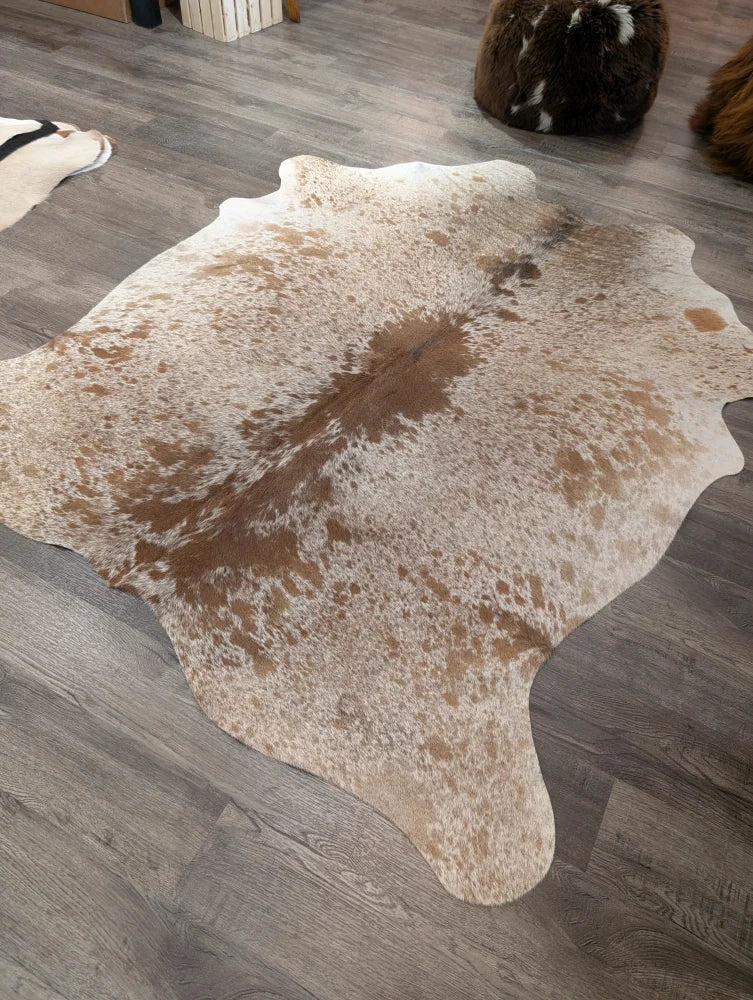 T21 72 x 62 large cowhide rug by Angus Oliver with natural white beige and brown mottled pattern