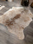 T21 72 x 62 large cowhide rug by Angus Oliver with natural white beige and brown mottled pattern