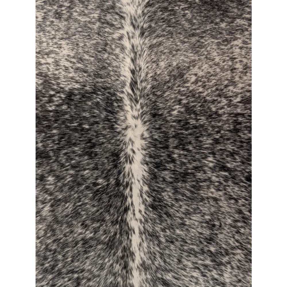 T22 large cowhide rug 67 x 73 with black and white speckles and a lighter stripe from angus oliver