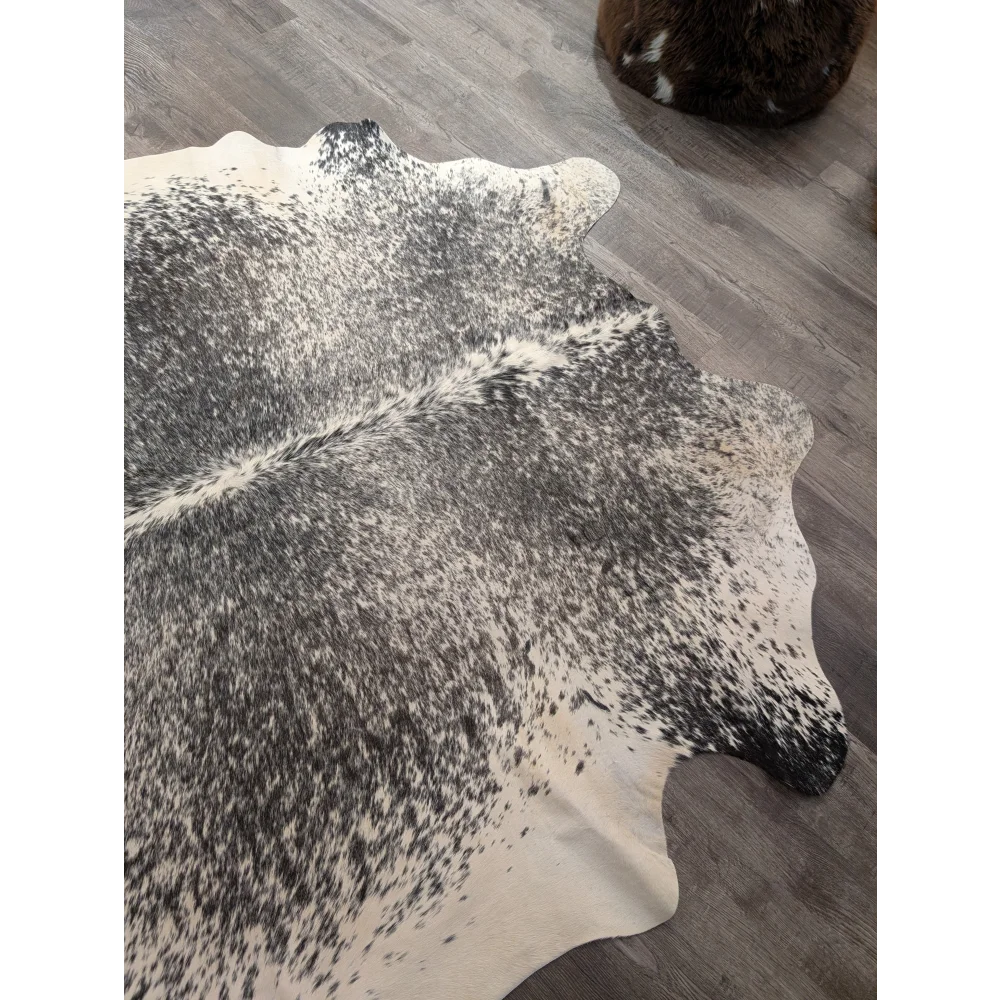 Large cowhide rug t22 featuring soft textured fur in a striking black and white angus oliver spotted pattern