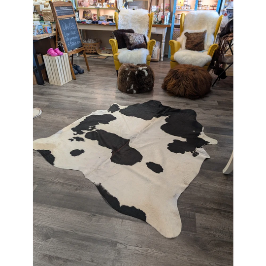 Large cowhide black and white cowhide rug with natural irregular pattern angus oliver t25 67.5 x 64