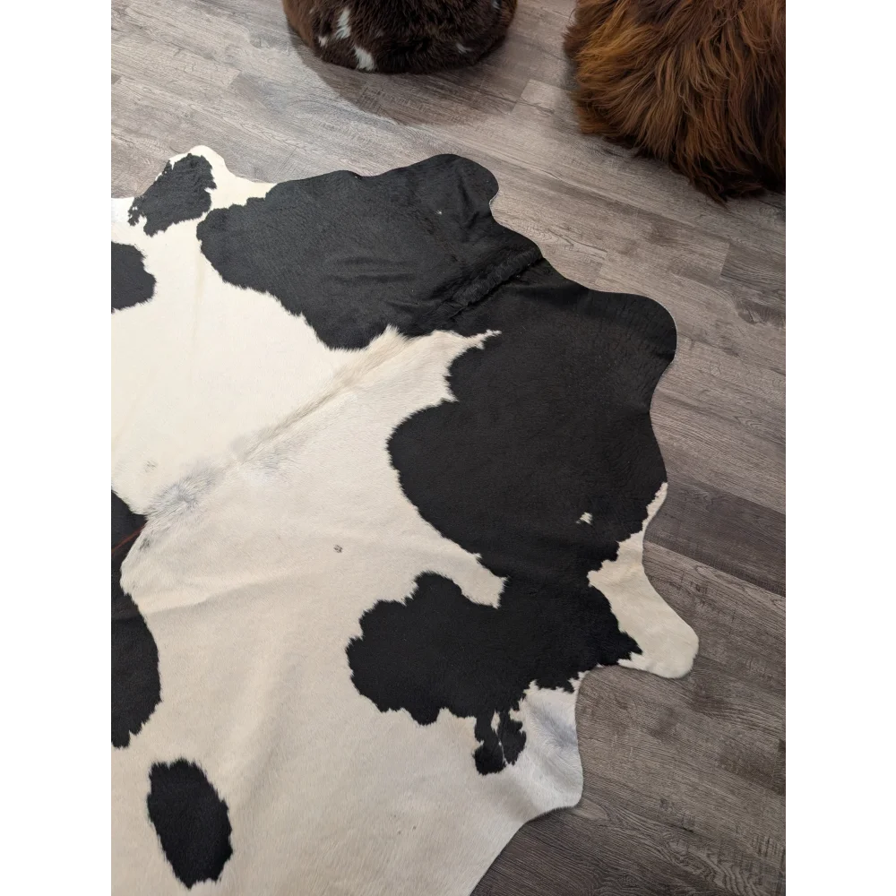 Large cowhide rug t25 67.5 x 64 with black and white natural irregular patches angus oliver style
