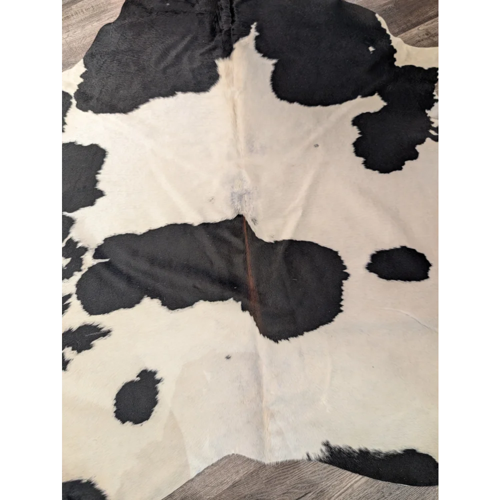 Large black and white angus oliver cowhide rug with natural fur texture t25 67.5 by 64 inches