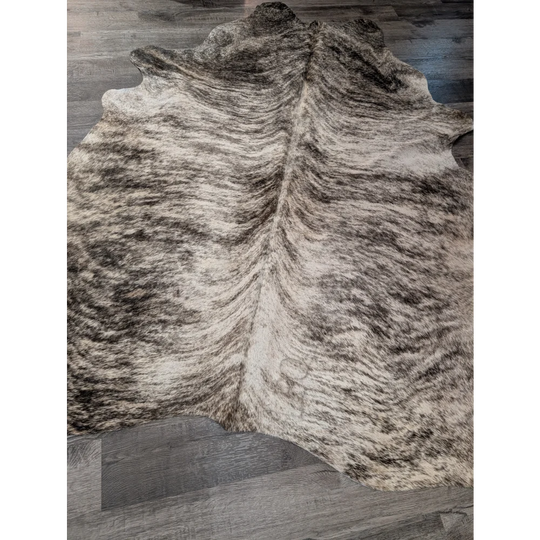 Large cowhide rug t26 angus oliver with irregular dark brown and cream mottled pattern measuring 68 x 63 inches