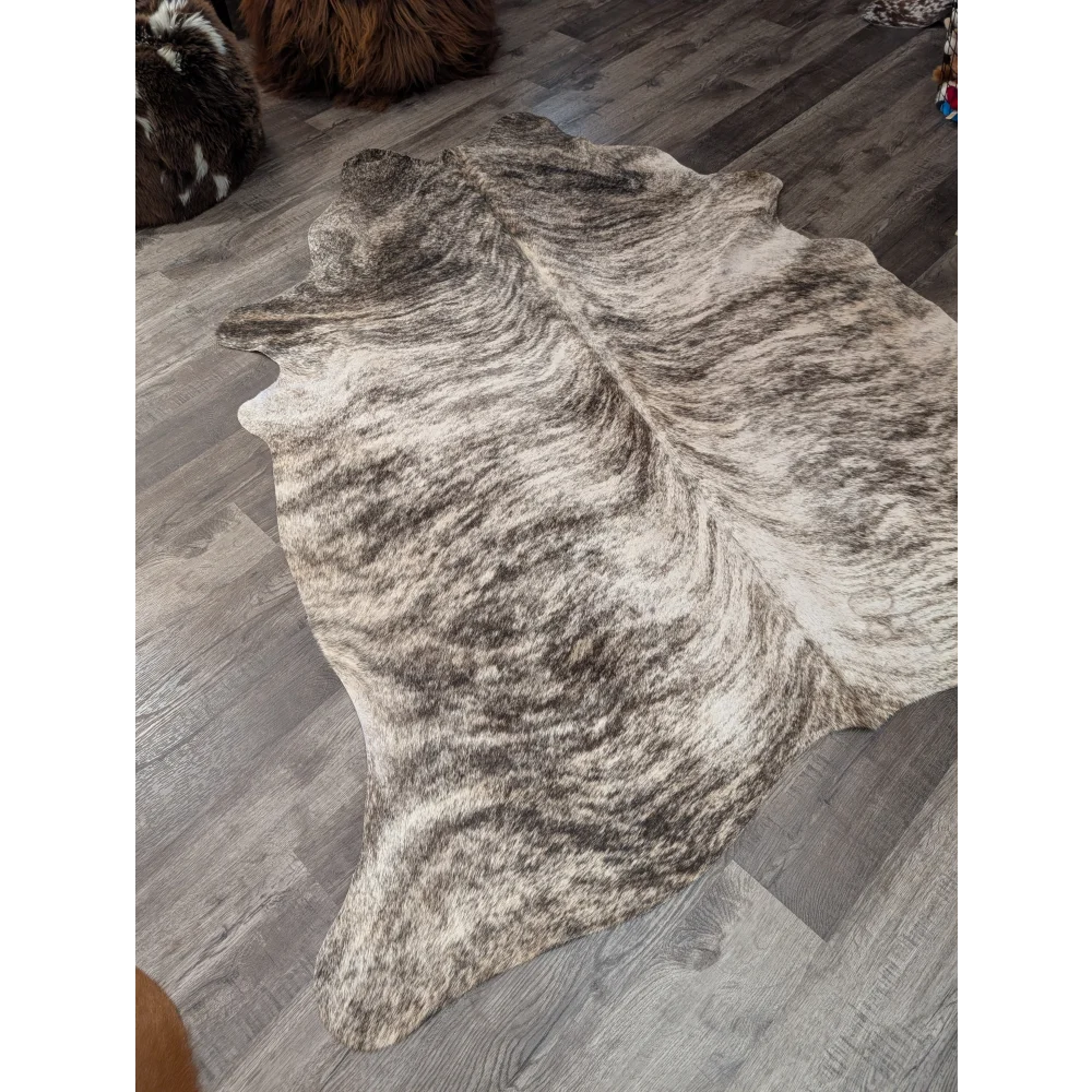 Large cowhide rug t26 with irregular white and dark brown mottled pattern perfect for angus oliver decor