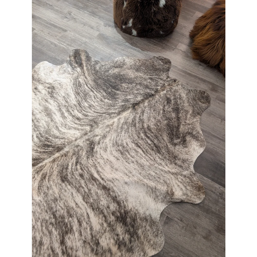 T26 68 x 63 large cowhide rug with natural tones and mottled gray white and brown fur by angus oliver
