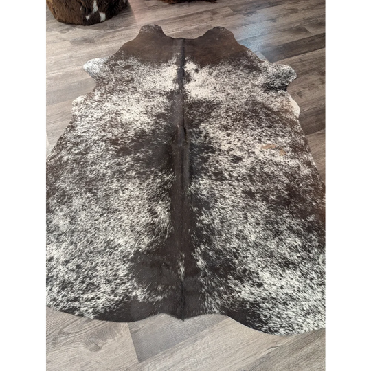 Large cowhide rug t28 in brown and white speckled angus oliver with natural textured surface perfect for decor