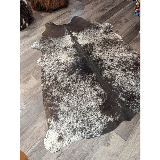 T28 76 x 62 gorgeous cowhide rug featuring a natural brown and white speckled angus oliver large cowhide pattern