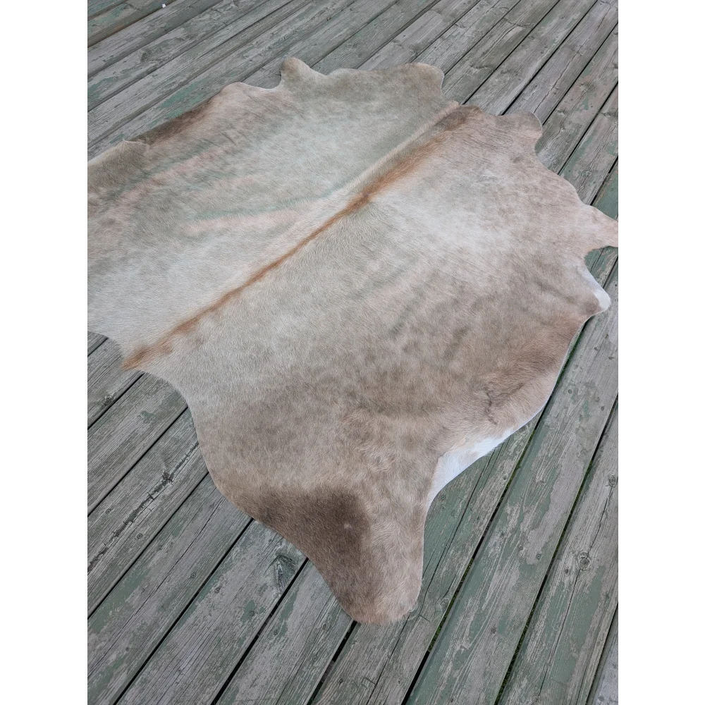 T3 66.5 x 62 large cowhide rug with unique characteristics in natural tones and subtle brownish gray hues