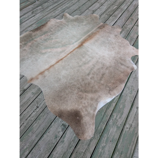 T3 66.5 x 62 large cowhide rug with unique characteristics in natural tones and subtle brownish gray hues