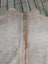 T#3 66.5 x 62 large cowhide rug with soft light gray fur and subtle brown stripe showcasing unique characteristics