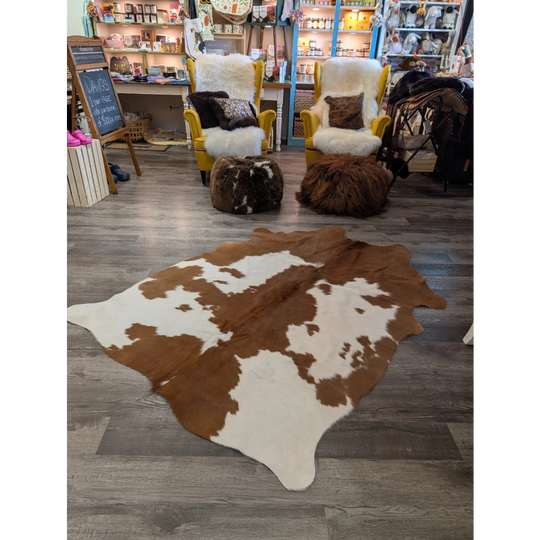 Large cowhide rug angus oliver with brown and white natural irregular patches perfect for stylish floors