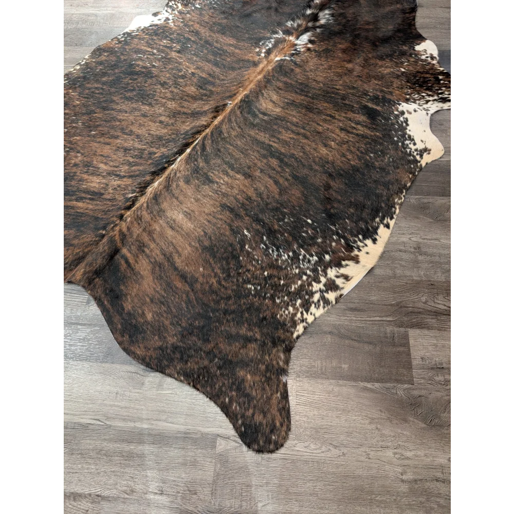 T32 78 x 59 gorgeous cowhide large cowhide rug with brown black and white angus oliver on wooden floor