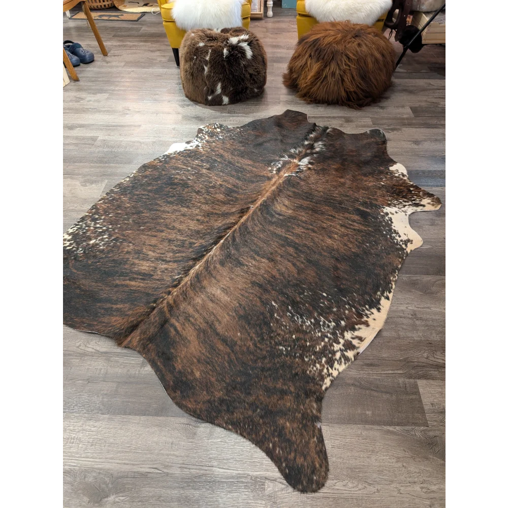 T32 78 x 59 large cowhide rug with brown and white natural irregular edges by angus oliver